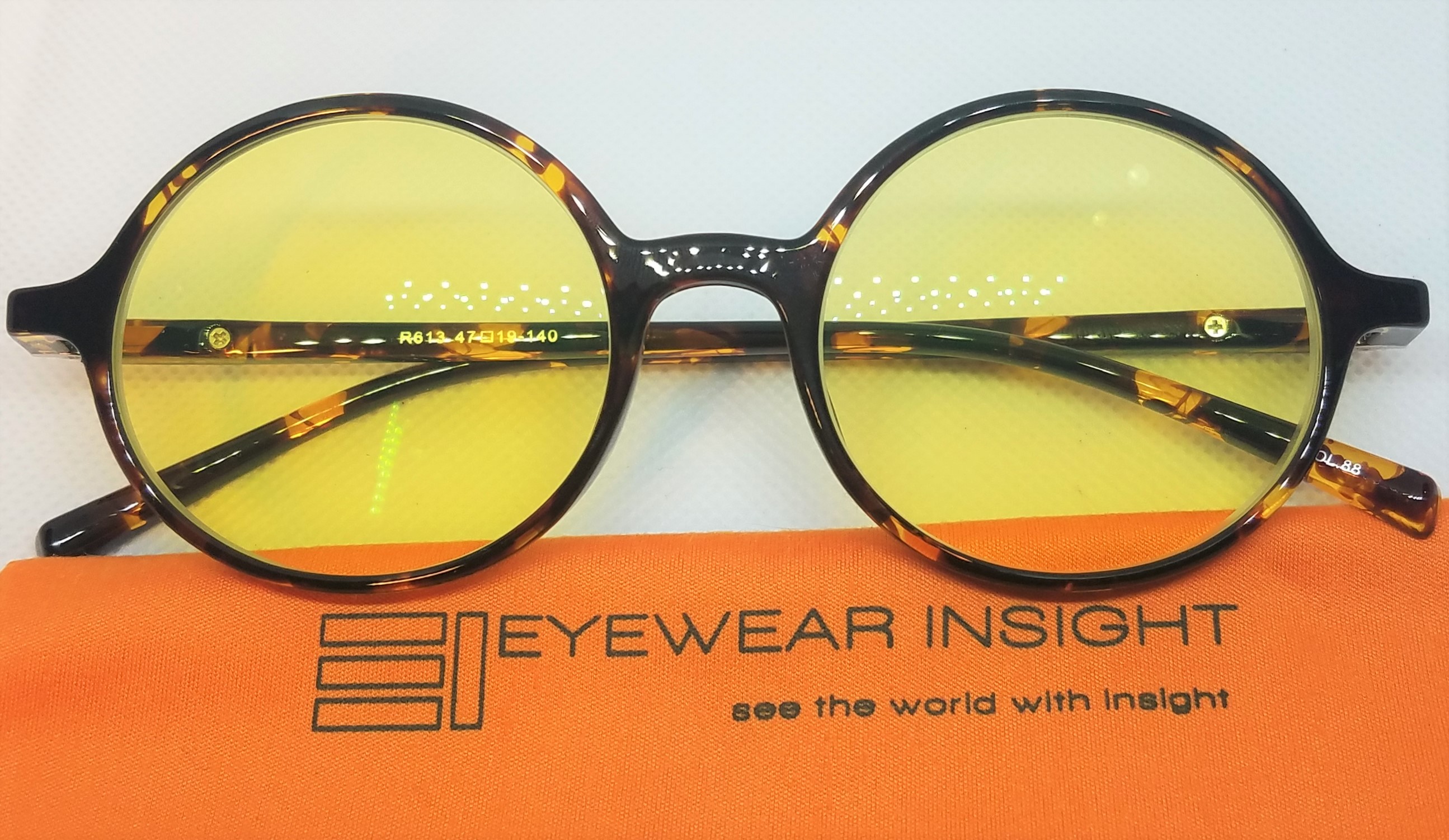 round tortoise glasses with yellow tint